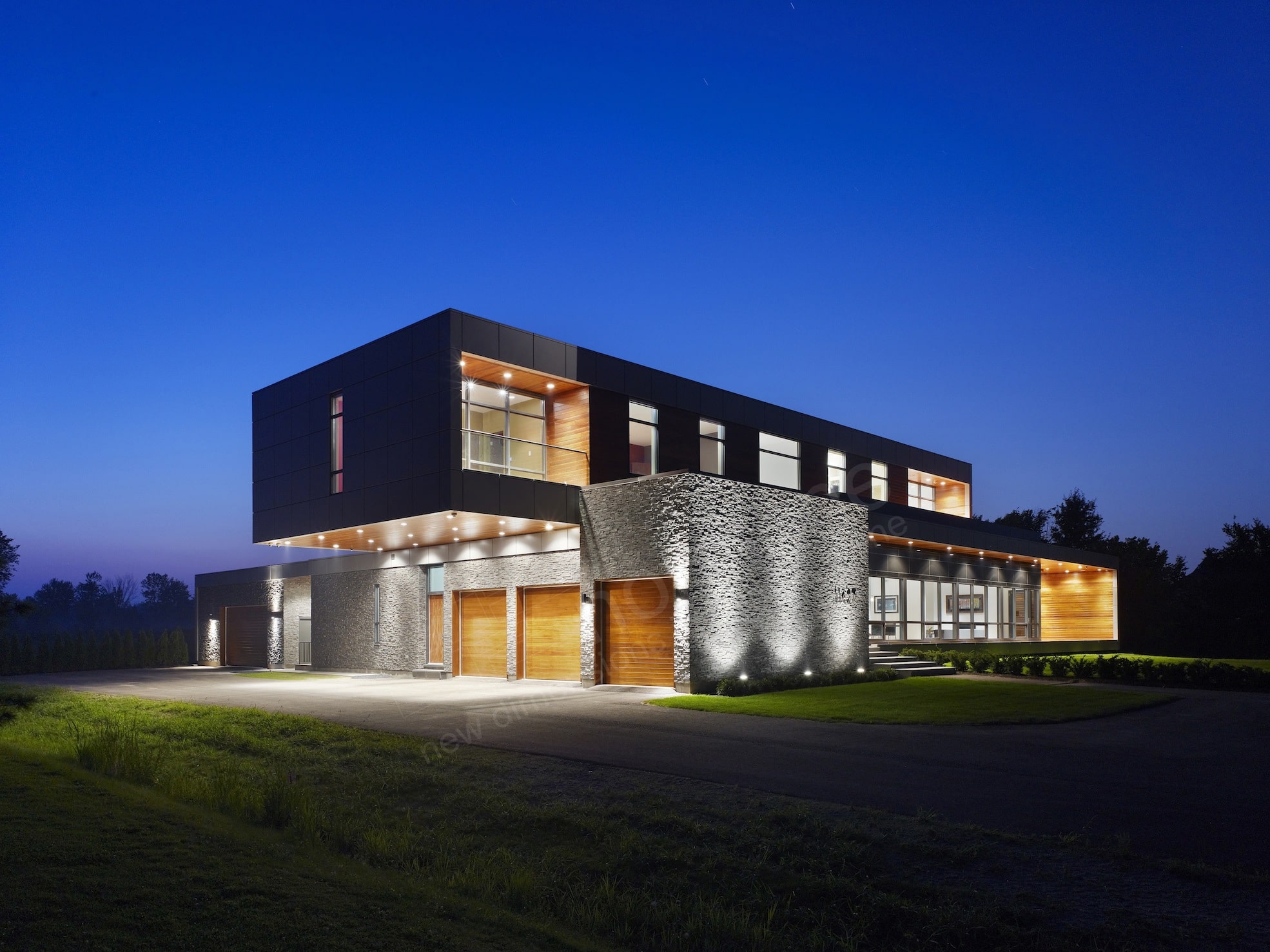 Norstone Charcoal Rock Panels used on exterior facade of ultra modern home in Niagra Falls Ontario